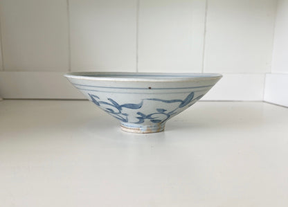 Side view of small floral ceramic bowl