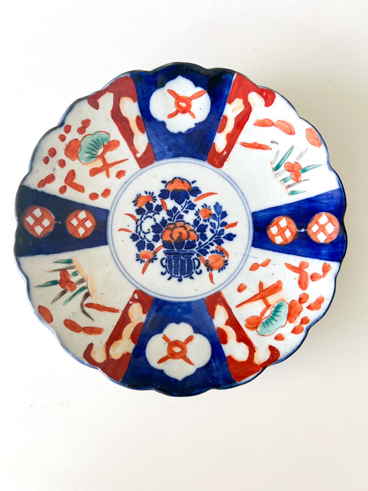 Top view of Asian-Inspired Plate in red, blue, and white color, with hand painted illustrations of fruits or flowers