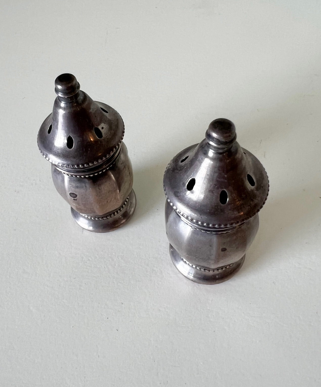 Top view of collectible Silverware Salt and Pepper Shakers